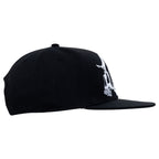 STRAPPED SNAPBACK HAT
